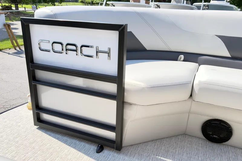 Slide: The Image of 2026 Coach Pontoons 223 RFC interior with sleek seating and stylish design elements. - 5
