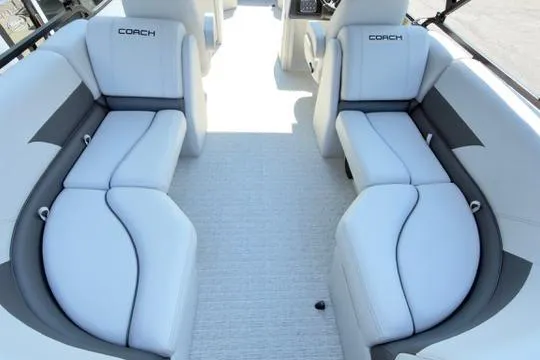 Slide: The Image of 2026 Coach Pontoons 223 RFC interior with luxurious seating and modern design. - 24