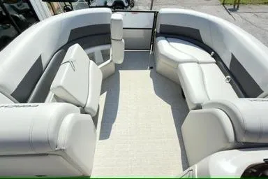 Slide: The Image of 2026 Coach Pontoons 223 RFC interior with spacious seating and modern design. - 11