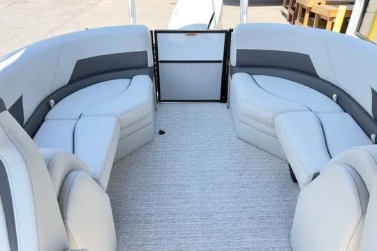 Slide: The Image of 2026 Coach Pontoons 223 RFC interior with plush seating and modern design. - 21