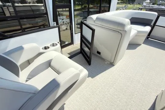 Slide: The Image of 2026 Coach Pontoons 223 RFC interior with plush seating and modern design. - 14