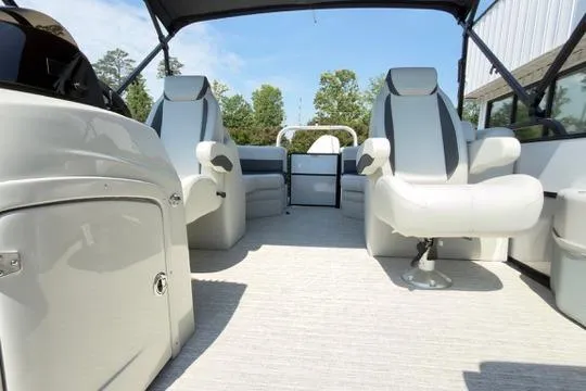 Slide: The Image of 2026 Coach Pontoons 223 RFC interior with luxurious seating and modern design. - 12