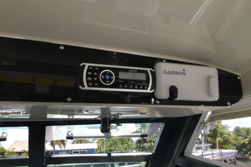 Slide: The Image of Interior of 2013 Everglades 320EX boat featuring Garmin navigation system. - 45