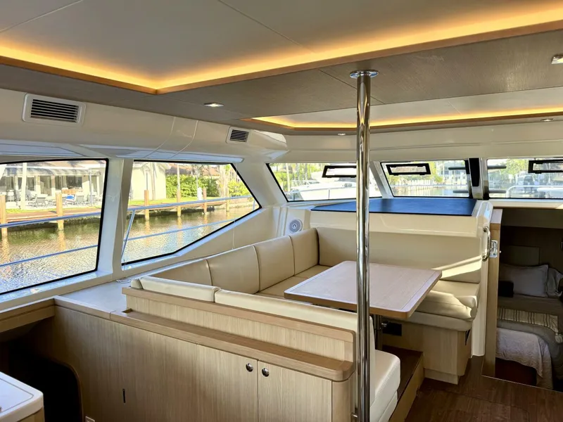 Slide: The Image of Luxurious interior of 2022 Aquila 44 yacht with spacious seating and modern design. - 12