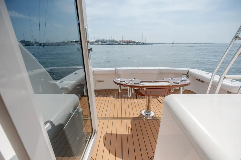 Slide: The Image of 2003 Bertram 390 Convertible yacht deck with ocean view and fishing station. - 49