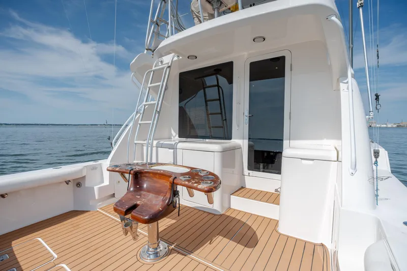 Slide: The Image of 2003 Bertram 390 Convertible yacht deck with fishing chair and ocean view. - 50