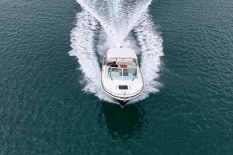 Slide: The Image of Aerial view of 2020 Hunt Yachts Harrier 26 cruising on open water. - 12