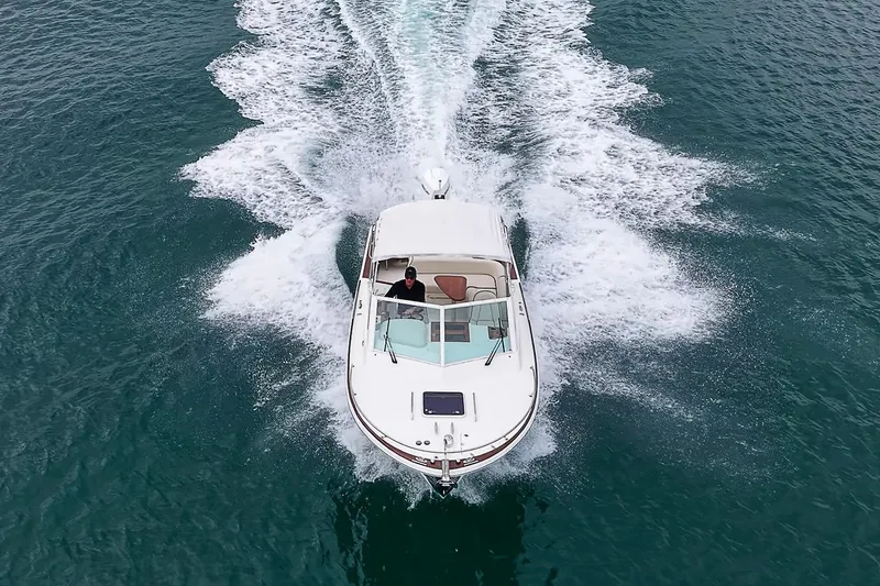 Slide: The Image of Aerial view of 2020 Hunt Yachts Harrier 26 cruising on open water. - 13