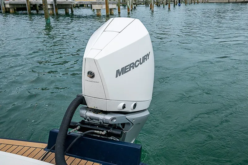Slide: The Image of 2020 Hunt Yachts Harrier 26 with Mercury outboard engine on water. - 27