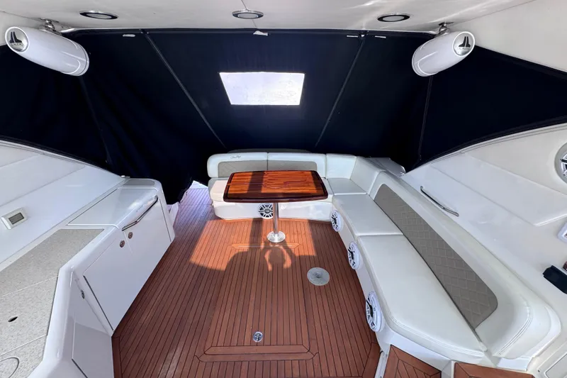 Slide: The Image of Luxurious interior of 2011 Sea Ray 540 Sundancer yacht with elegant seating and wood flooring. - 24