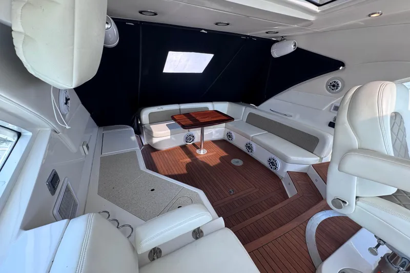 Slide: The Image of Luxurious interior of 2011 Sea Ray 540 Sundancer yacht with elegant seating and wood flooring. - 25