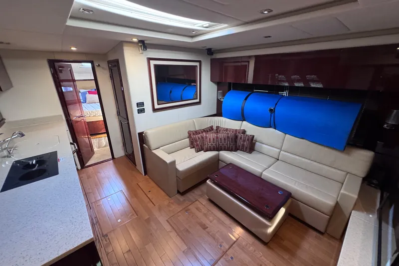 Slide: The Image of Luxurious interior of 2011 Sea Ray 540 Sundancer yacht with modern furnishings. - 47