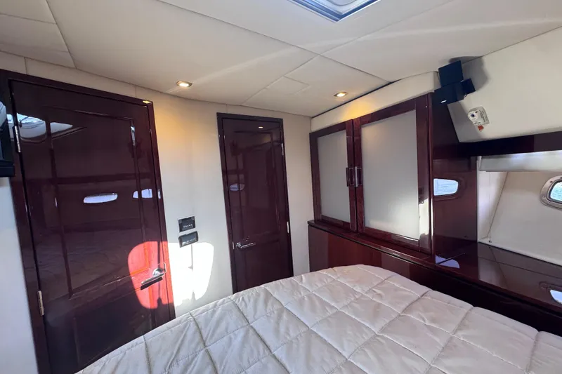 Slide: The Image of Luxurious interior of 2011 Sea Ray 540 Sundancer yacht with elegant wood finishes. - 52