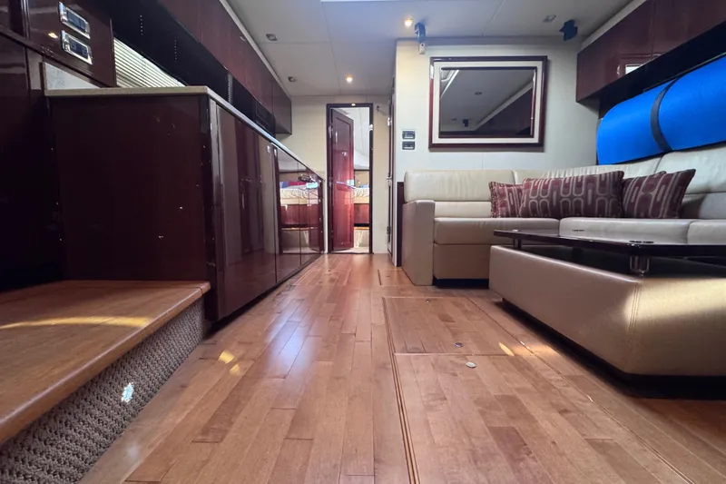 Slide: The Image of Luxurious interior of 2011 Sea Ray 540 Sundancer yacht with elegant wood flooring and modern furnishings. - 59