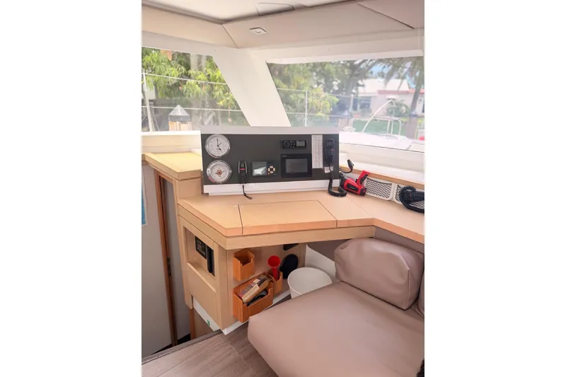 Slide: The Image of Interior helm station of 2018 Fountaine Pajot Lucia 40 catamaran, featuring navigation equipment. - 20