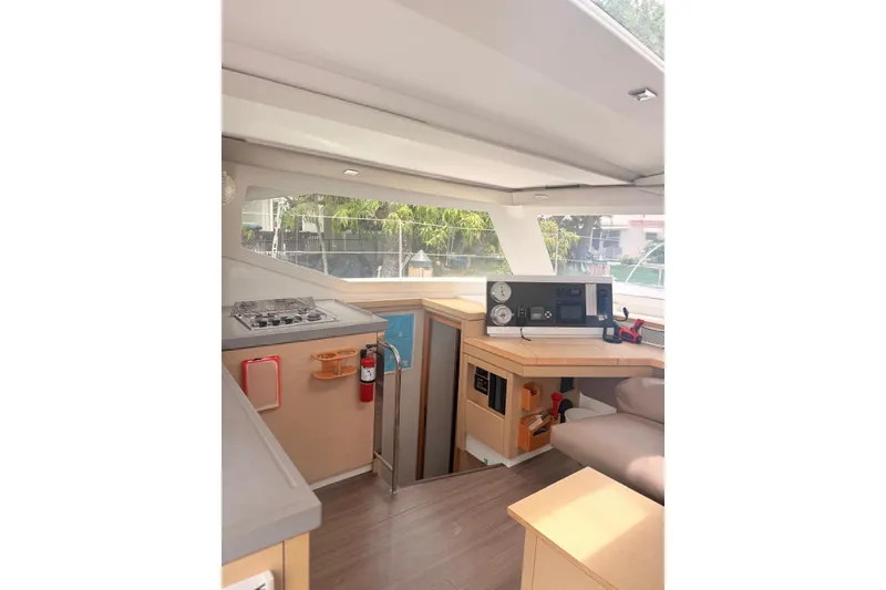 Slide: The Image of Interior of 2018 Fountaine Pajot Lucia 40 catamaran with modern navigation equipment. - 21