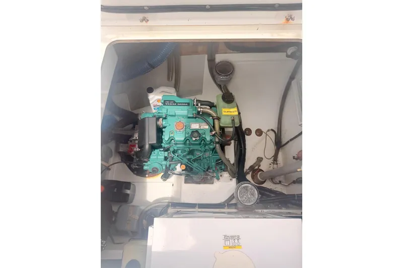 Slide: The Image of Engine compartment of 2018 Fountaine Pajot Lucia 40 catamaran, showcasing mechanical components. - 24