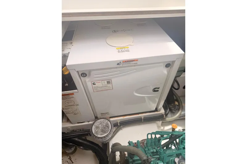 Slide: The Image of Engine compartment of 2018 Fountaine Pajot Lucia 40 catamaran with Cummins Onan generator. - 25