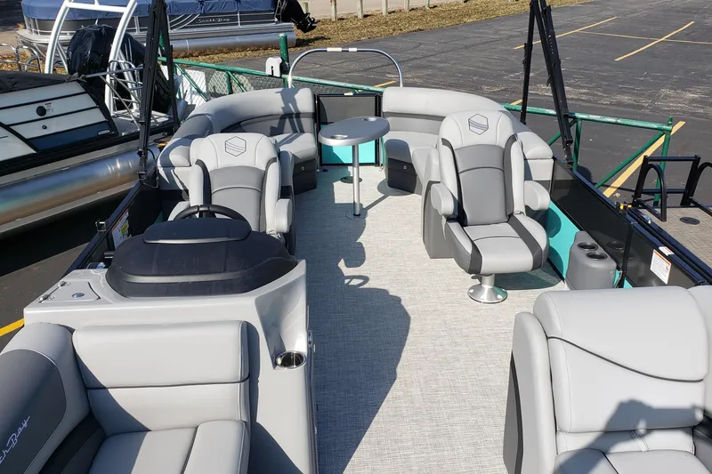 Slide: The Image of Interior of a 2023 South Bay S224RS25 pontoon boat with luxurious seating. - 3