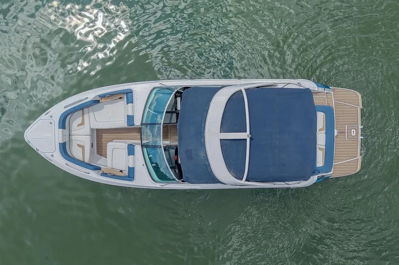 Slide: The Image of Overhead view of 2014 Four Winns H290 boat on water. - 7