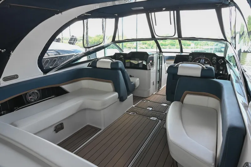 Slide: The Image of Interior of 2014 Four Winns H290 boat with spacious seating and modern design. - 8
