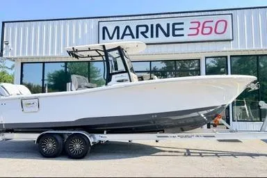 The Image of 2026 Sea Hunt Gamefish 27 boat with forward seating on a trailer at Marine 360 dealership. - 1