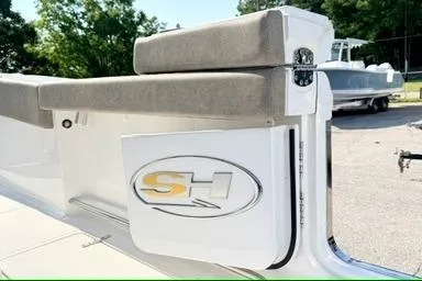 Slide: The Image of 2026 Sea Hunt Gamefish 27 Forward Seating boat with logo and cushioned seating. - 4