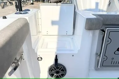 Slide: The Image of 2026 Sea Hunt Gamefish 27 boat interior with seating and storage compartments. - 9