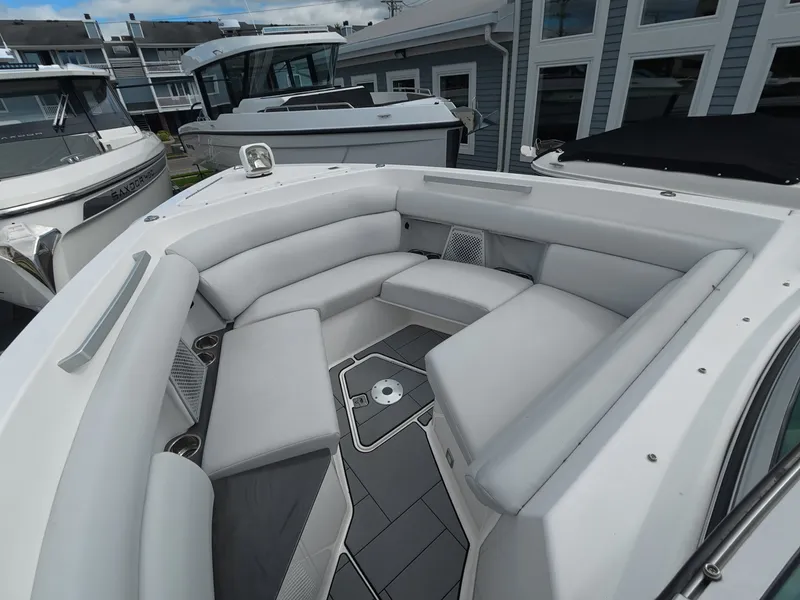 Slide: The Image of The image shows the cockpit of a 2021 Aviara AV32 OB with sleek gray upholstery. - 23