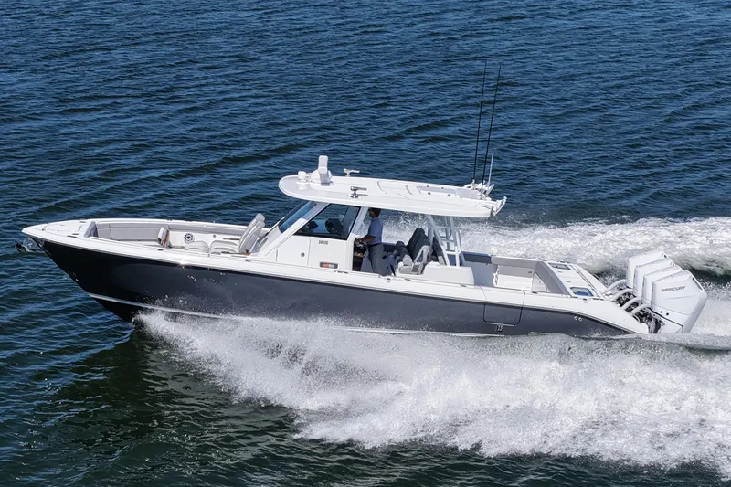 The Image of 2026 Everglades 395 Center Console boat cruising on open water. - 0