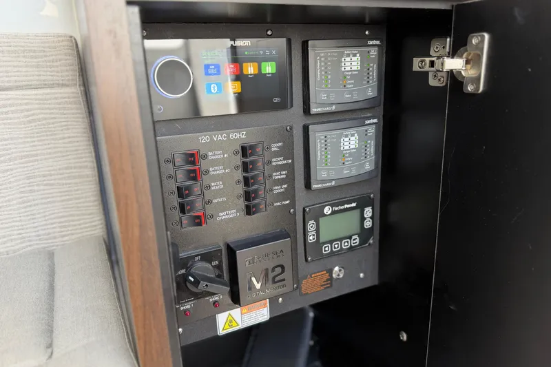 Slide: The Image of Electrical control panel inside 2026 Everglades 395 Center Console boat. - 105
