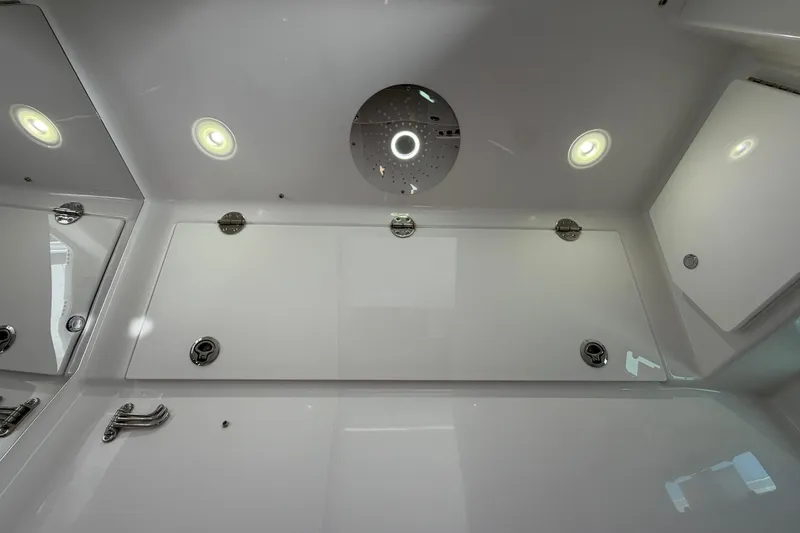Slide: The Image of Interior view of 2026 Everglades 395 Center Console boat with modern lighting. - 110