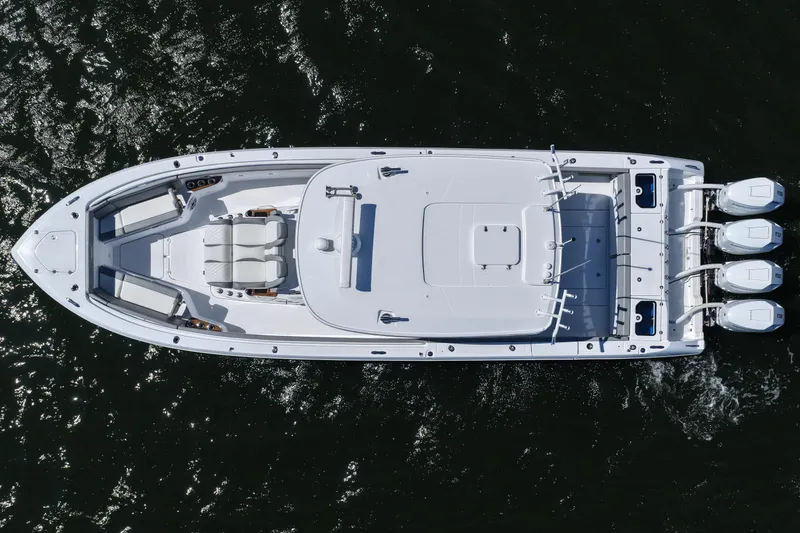 Slide: The Image of Overhead view of 2026 Everglades 395 Center Console boat on water. - 17