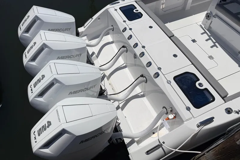 Slide: The Image of 2026 Everglades 395 Center Console with four powerful Mercury outboard engines. - 19