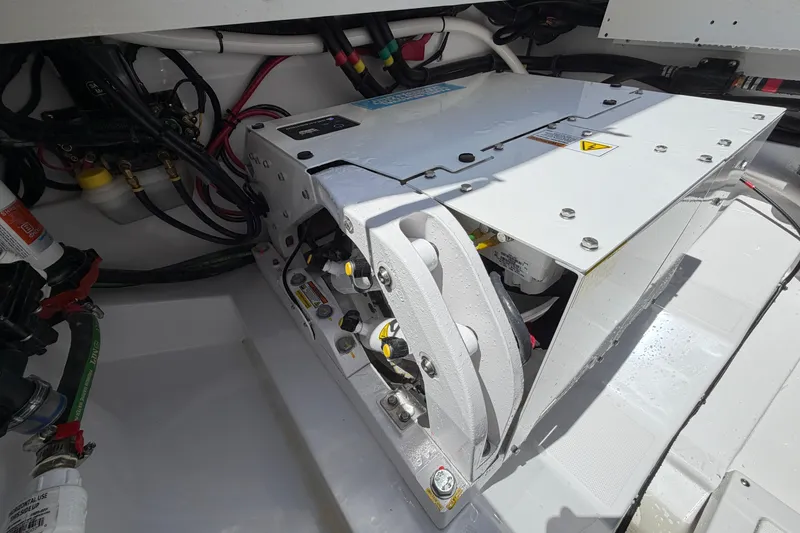 Slide: The Image of Engine compartment of 2026 Everglades 395 Center Console boat, showcasing mechanical components. - 30