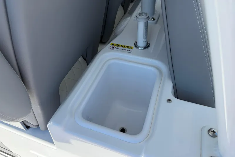 Slide: The Image of 2026 Everglades 395 Center Console boat interior detail with caution label. - 49