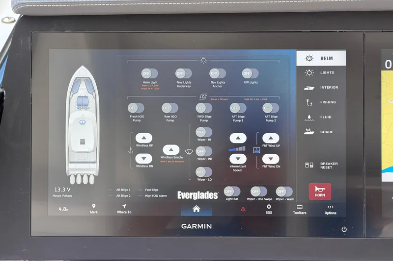 Slide: The Image of Touchscreen control panel of a 2026 Everglades 395 Center Console boat. - 52
