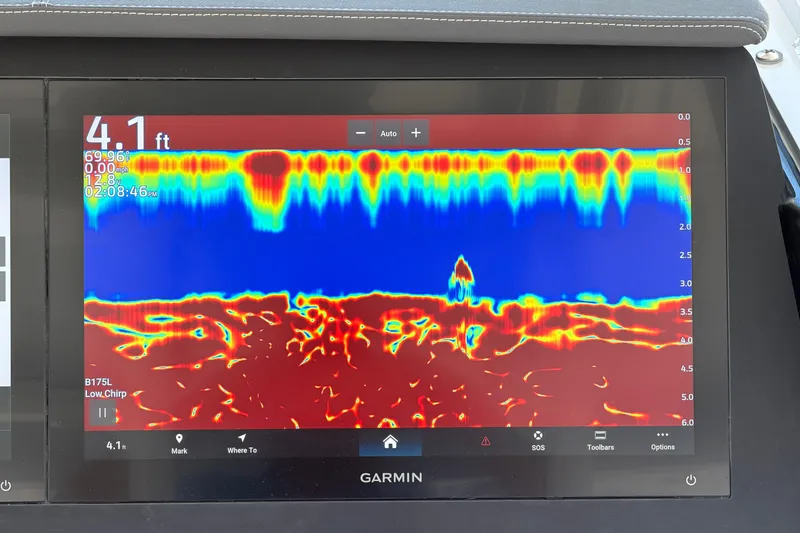 Slide: The Image of Garmin sonar display on 2026 Everglades 395 Center Console, showing depth and underwater terrain. - 54