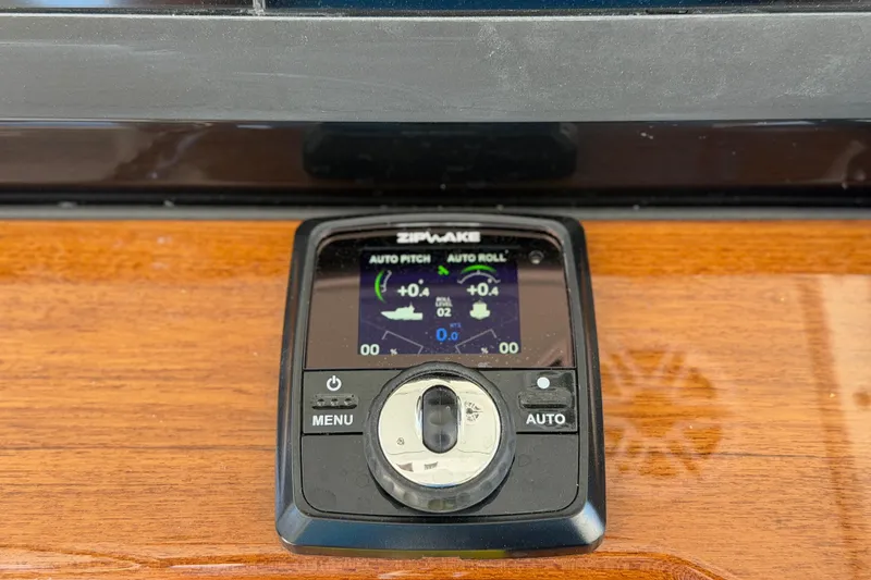 Slide: The Image of Control panel on 2026 Everglades 395 Center Console boat dashboard. - 64