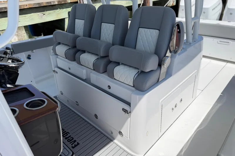 Slide: The Image of 2026 Everglades 395 Center Console boat interior with luxurious seating and modern design. - 66