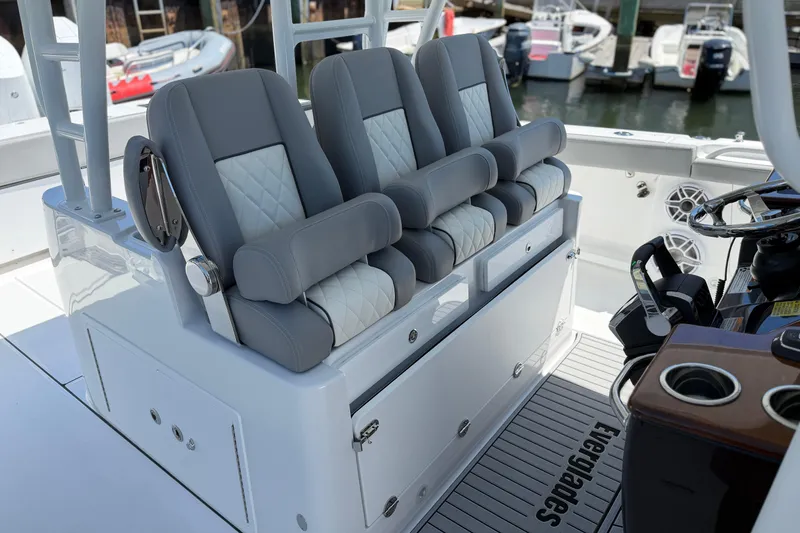 Slide: The Image of 2026 Everglades 395 Center Console boat with luxurious seating and modern helm design. - 67