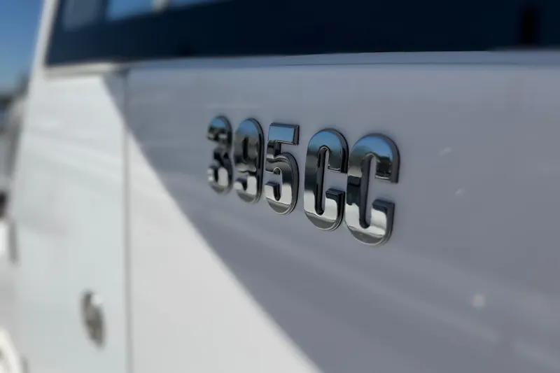 Slide: The Image of Close-up of 2026 Everglades 395 Center Console boat emblem. - 78