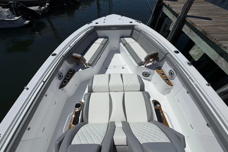 Slide: The Image of 2026 Everglades 395 Center Console boat interior with luxurious seating and modern amenities. - 79