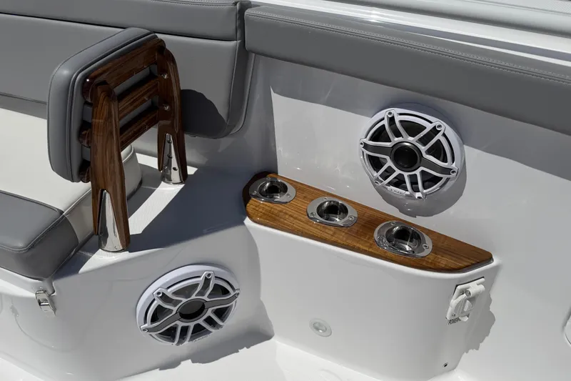 Slide: The Image of Luxury seating and speakers on 2026 Everglades 395 Center Console boat interior. - 82