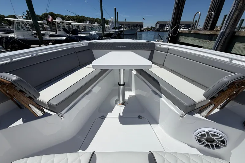 Slide: The Image of Interior view of 2026 Everglades 395 Center Console boat with seating and table. - 86