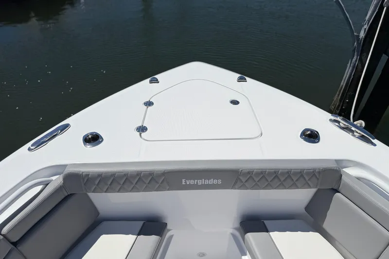 Slide: The Image of 2026 Everglades 395 Center Console boat bow with seating and storage. - 87