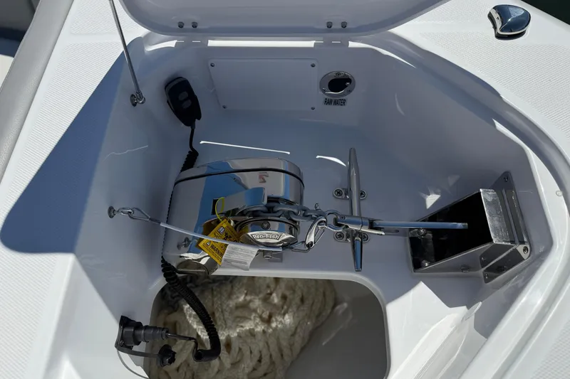 Slide: The Image of Anchor compartment of 2026 Everglades 395 Center Console boat, featuring Pro-Fish windlass system. - 89