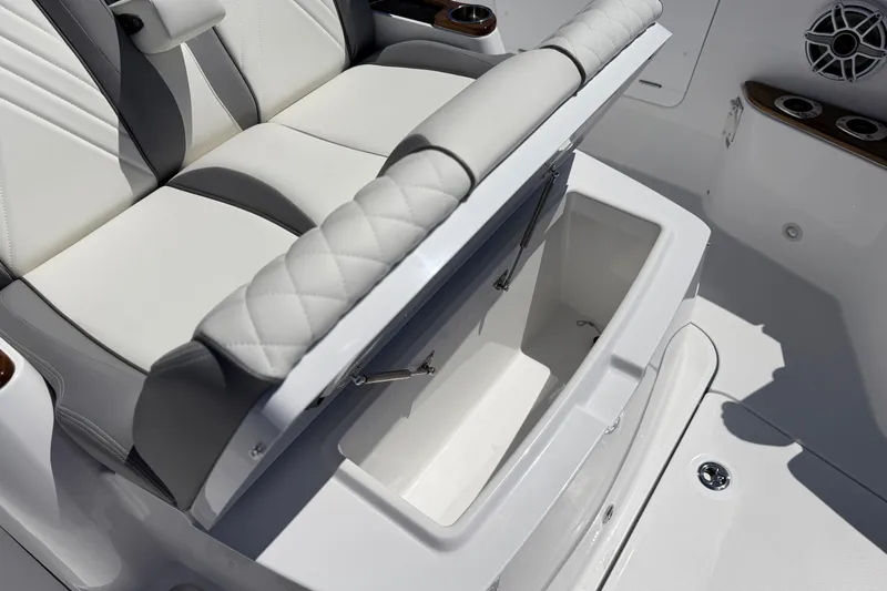 Slide: The Image of Luxury seating with storage on 2026 Everglades 395 Center Console boat. - 97