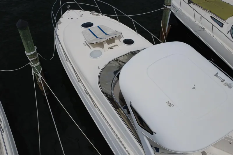 Slide: The Image of 2006 Regal Commodore 3560 yacht docked at marina, aerial view. - 3