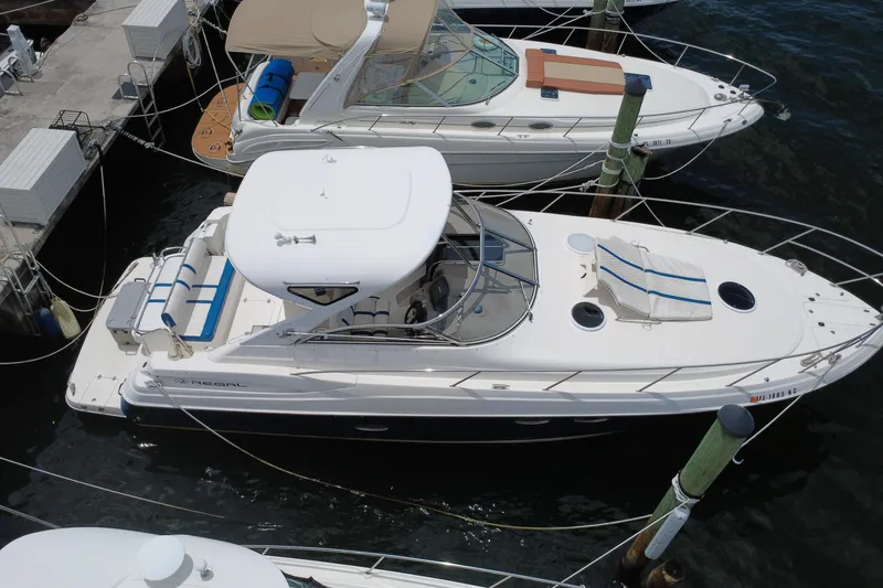 Slide: The Image of 2006 Regal Commodore 3560 yacht docked at marina, aerial view. - 8